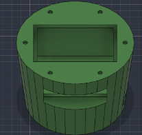 Green base with a window for the LCD and magnet holes around the rim